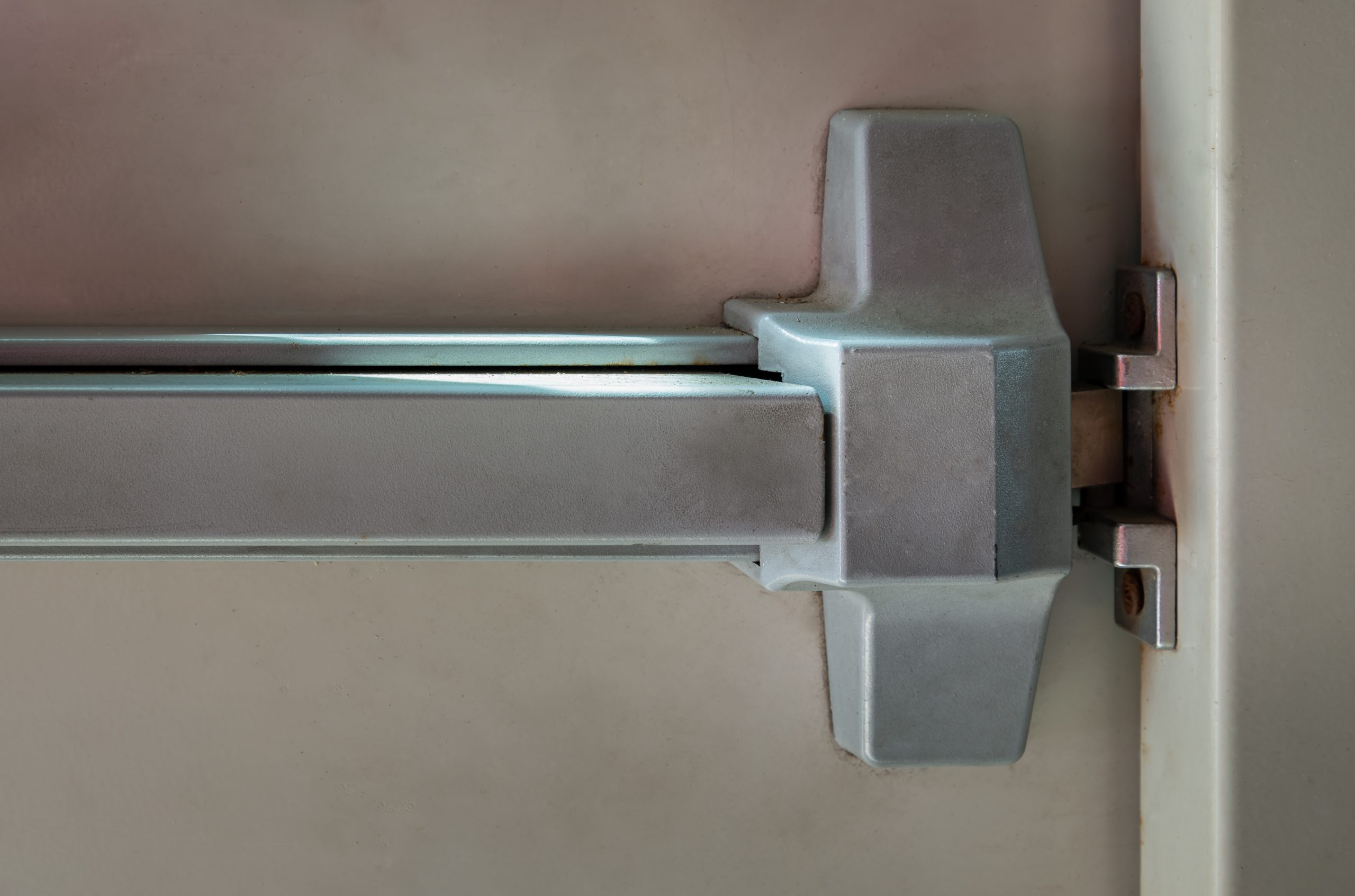 Close up of fire door latch